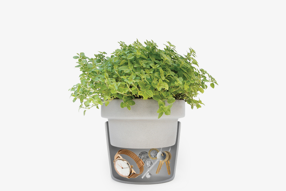 Plant pot hideaway split pot with watch keys and money