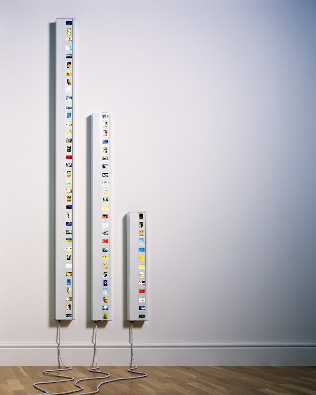 Slide Light : Display your old photos in a wall light.