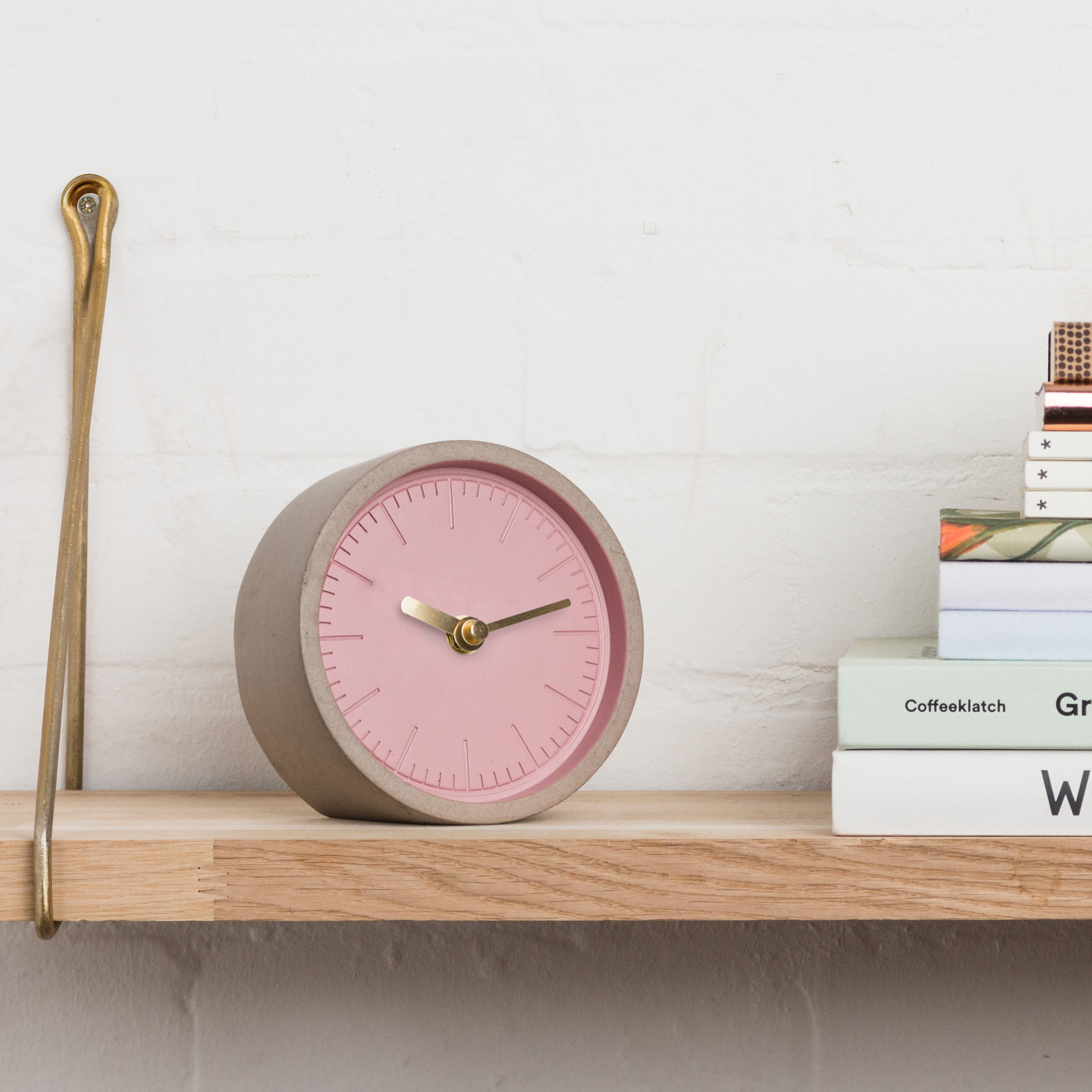 Pink Concrete Clock on Shelf