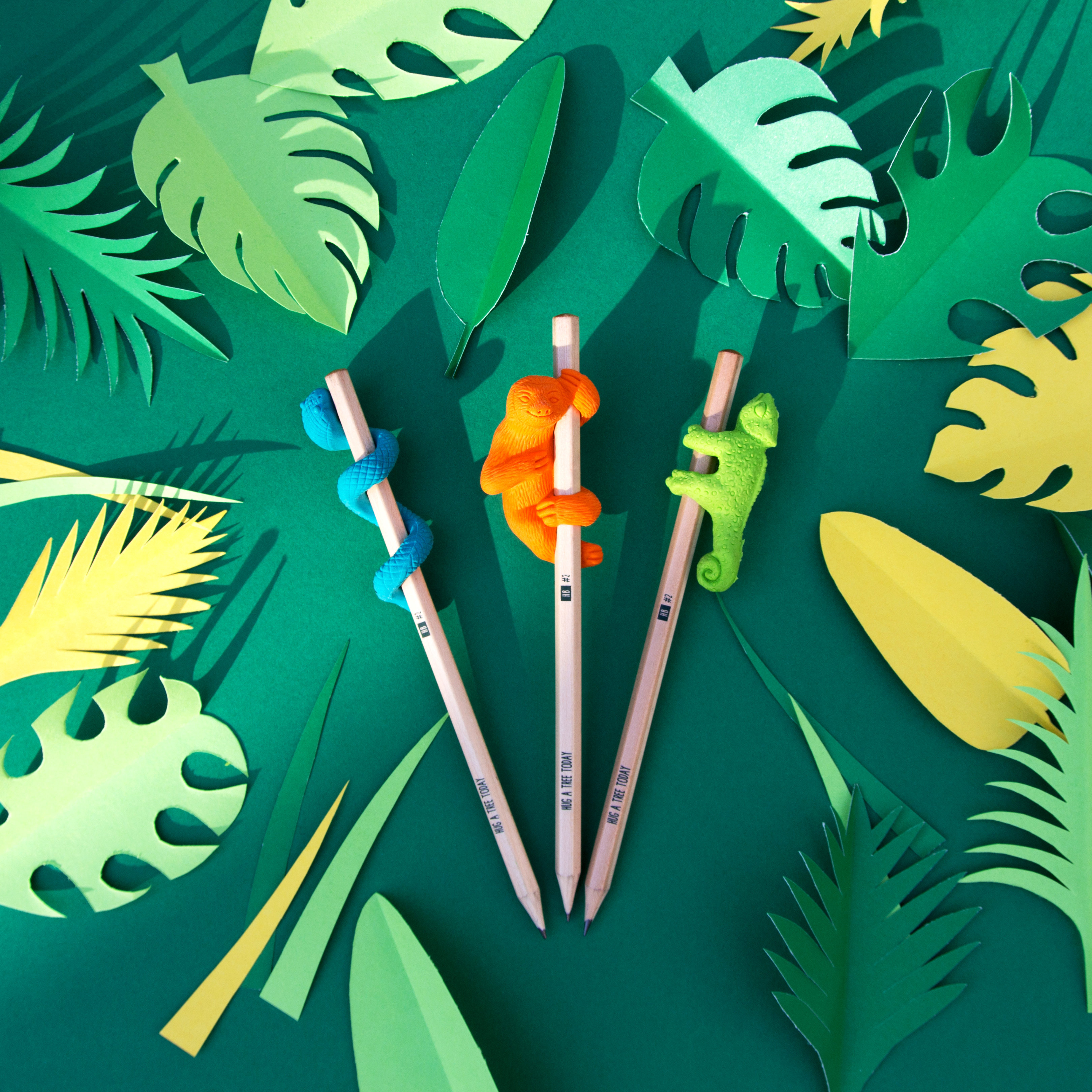 Jungle animal erasers on pencils with paper leaves