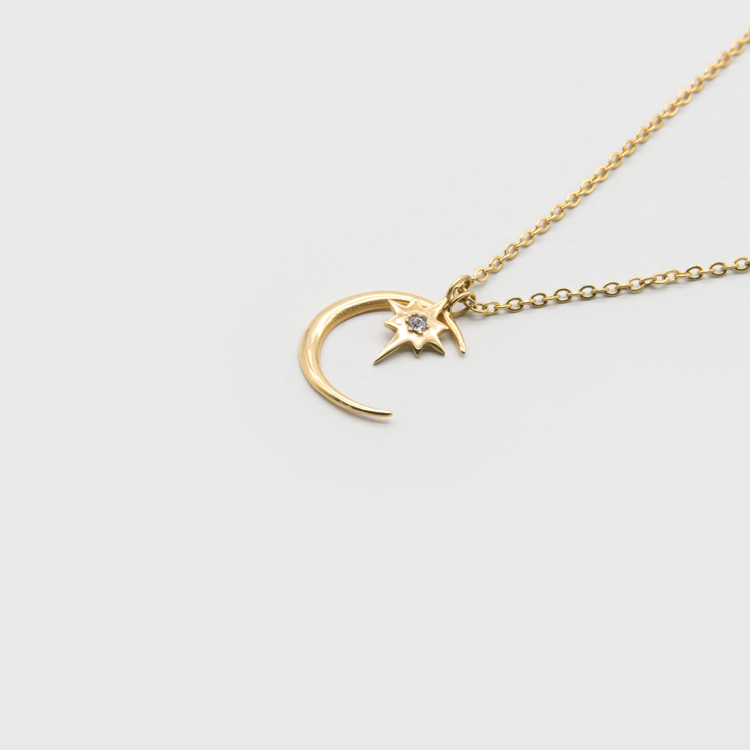 Kuku gold moon necklace with star charm