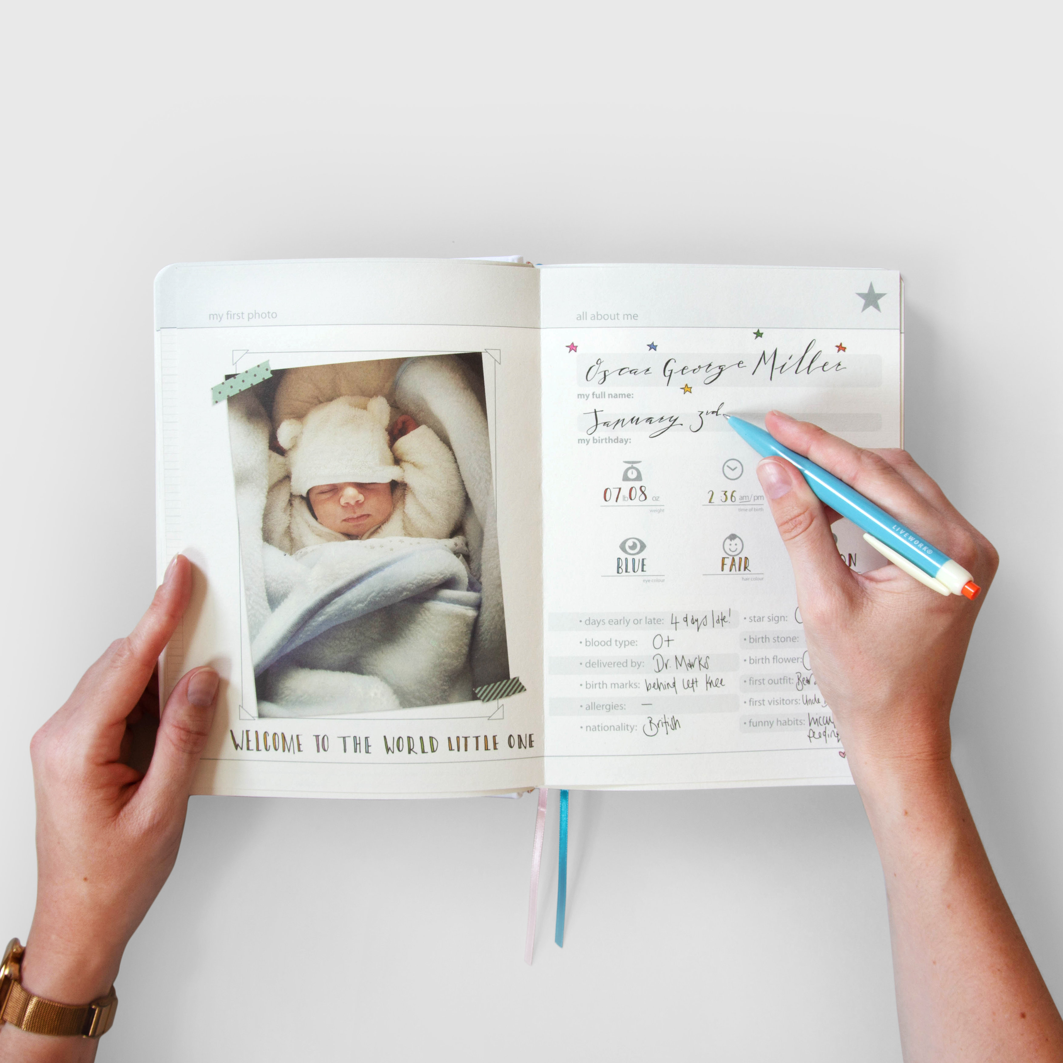 Writing in baby journal