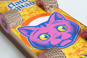 Illustrated cat face on scratching skateboard