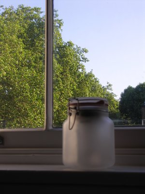 light jars near the window during day