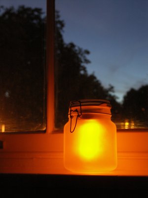 light jars near the window during night