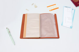 PU Leather Travel Notebook open on desk with pockets