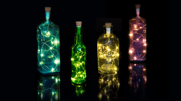 Rechargeable LED String lights shown in colourful bottles