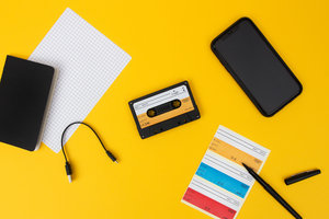 Cassette tape speaker on yellow desk
