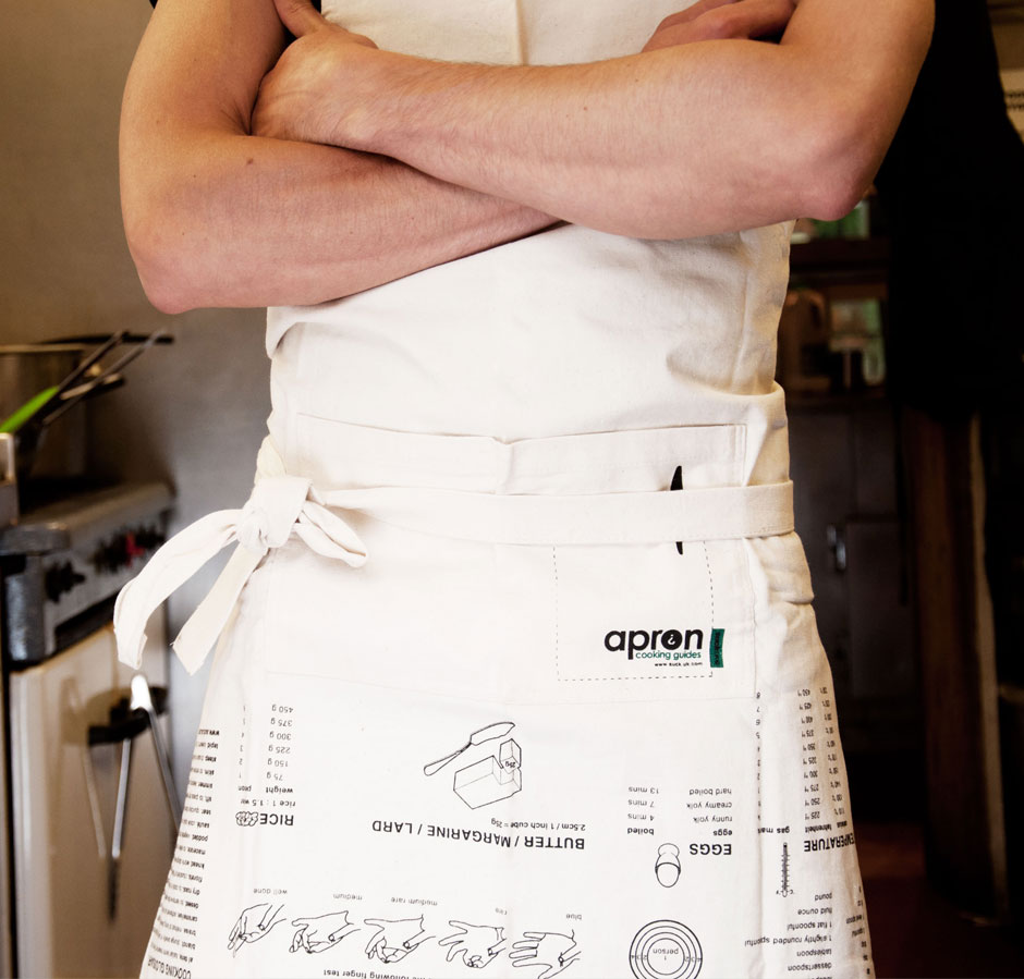 Kitchen cooking apron on model in kitchen