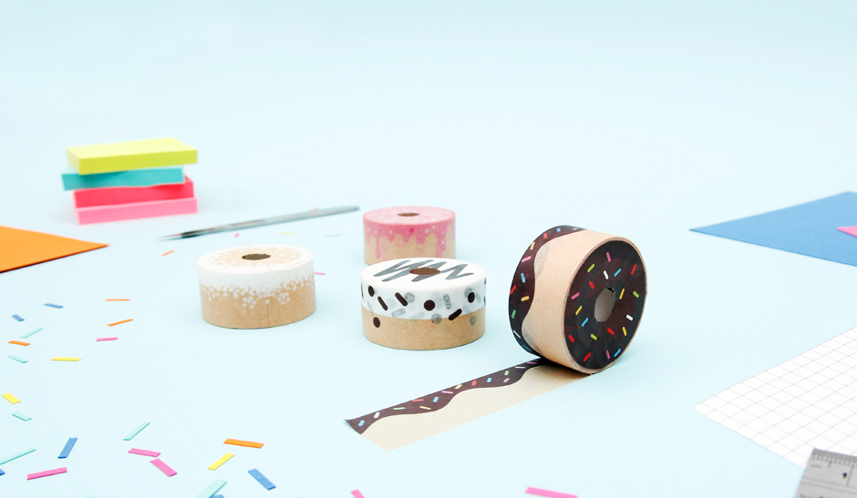 Doughnut tapes on desk with hundreds and thousands