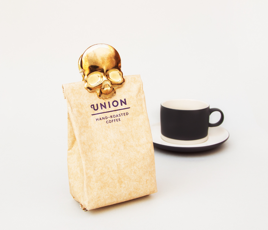 Brass finish skull clip for sealing coffee