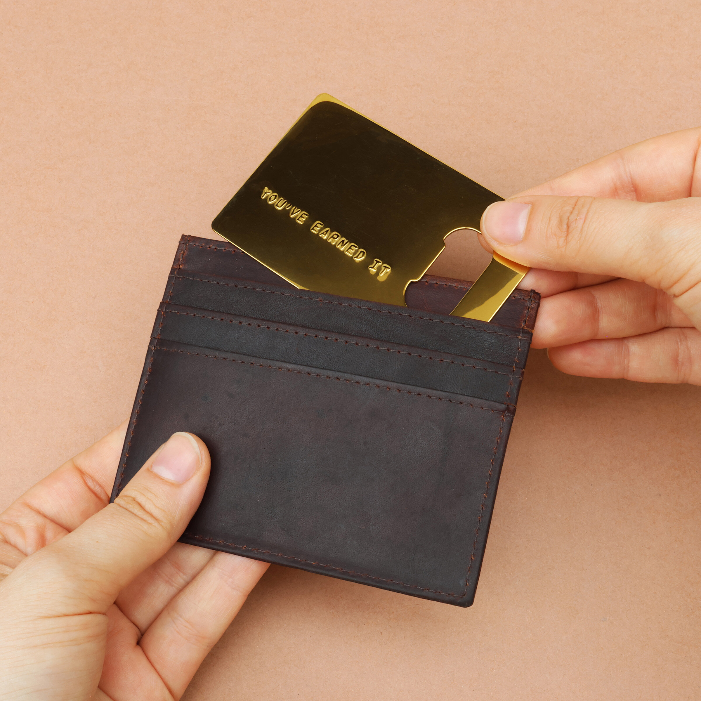 gold credit card opener in wallet