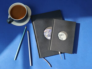 earth notebook, black, space, orbit, square grid, paper, drawing, lifestyle