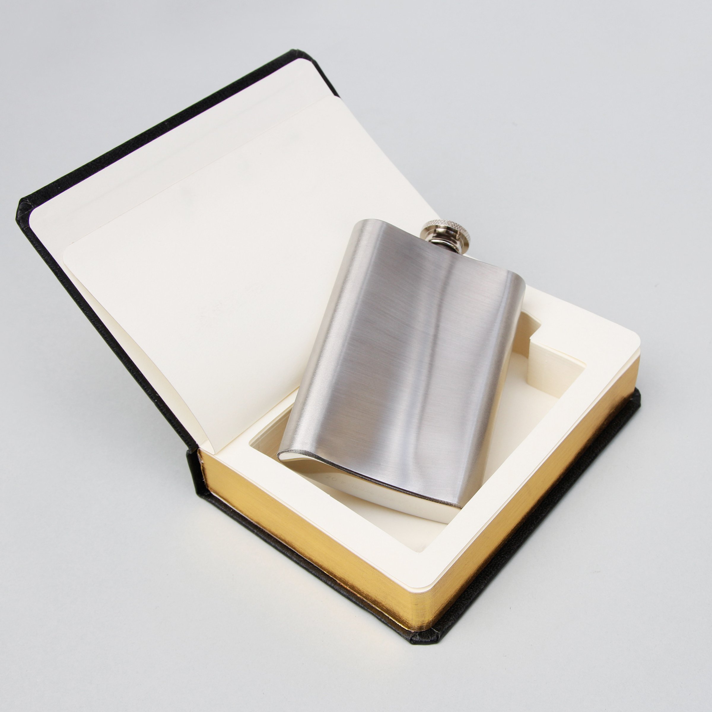 Flask hidden inside a book