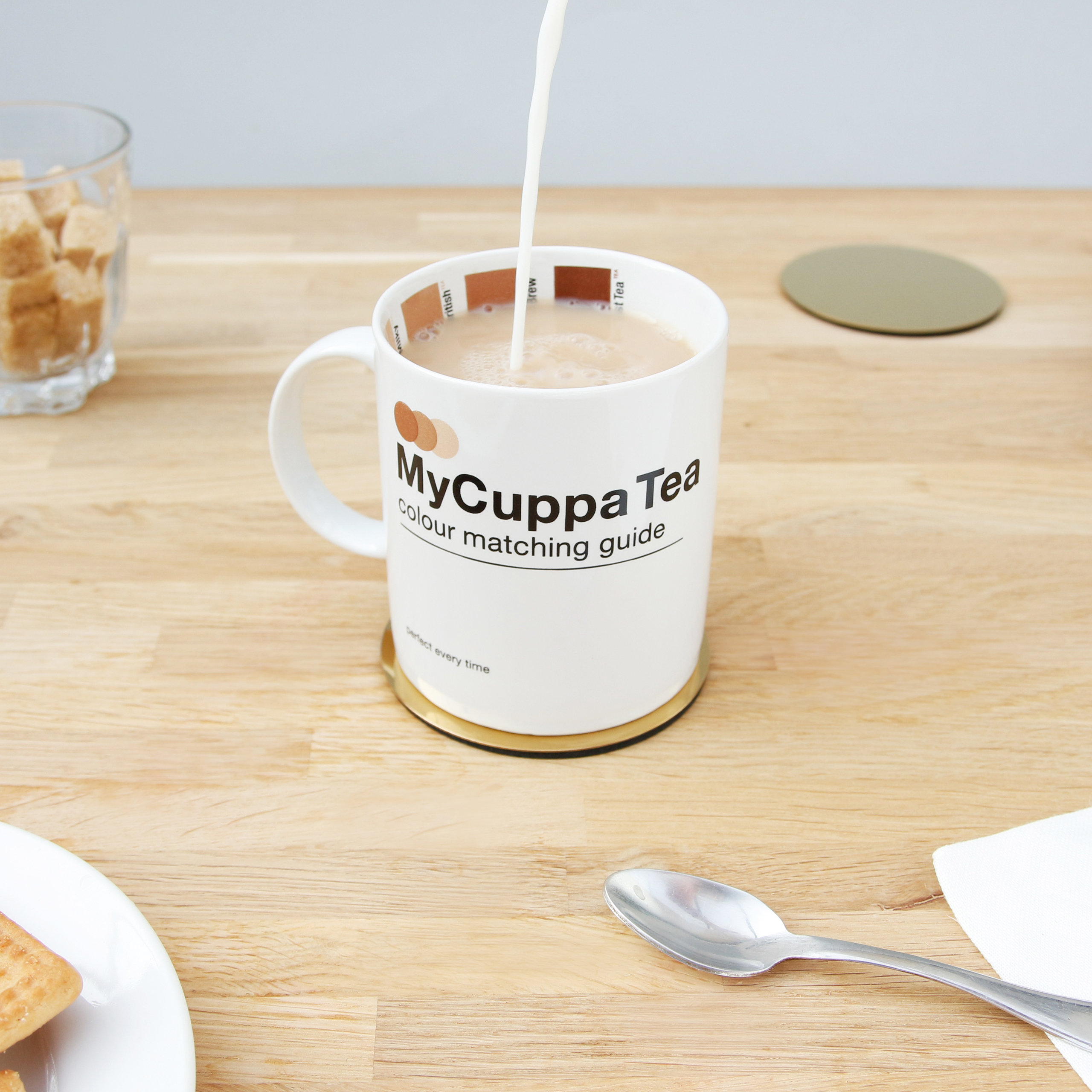 pouring milk into my cuppa tea mug