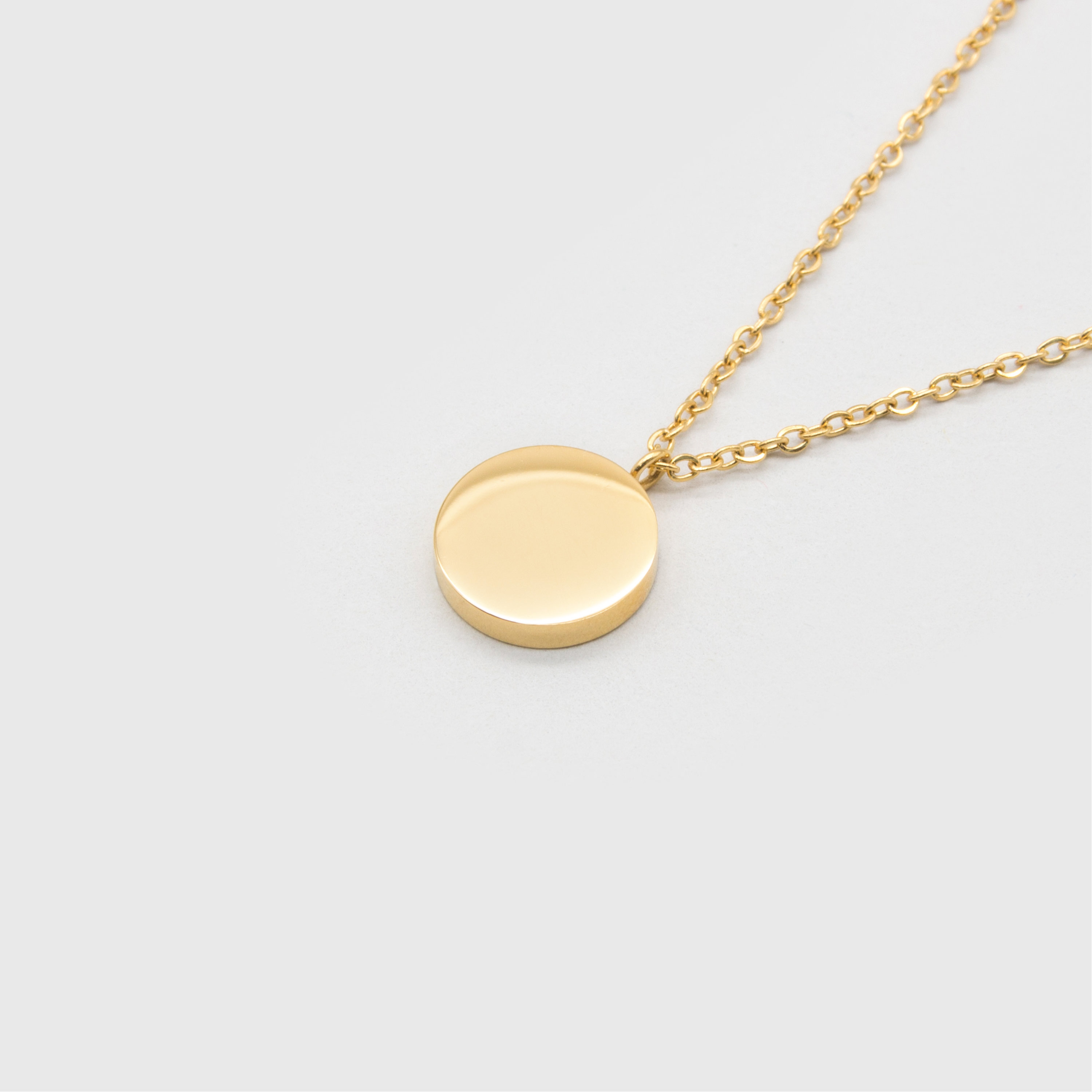 Kuku gold circle necklace