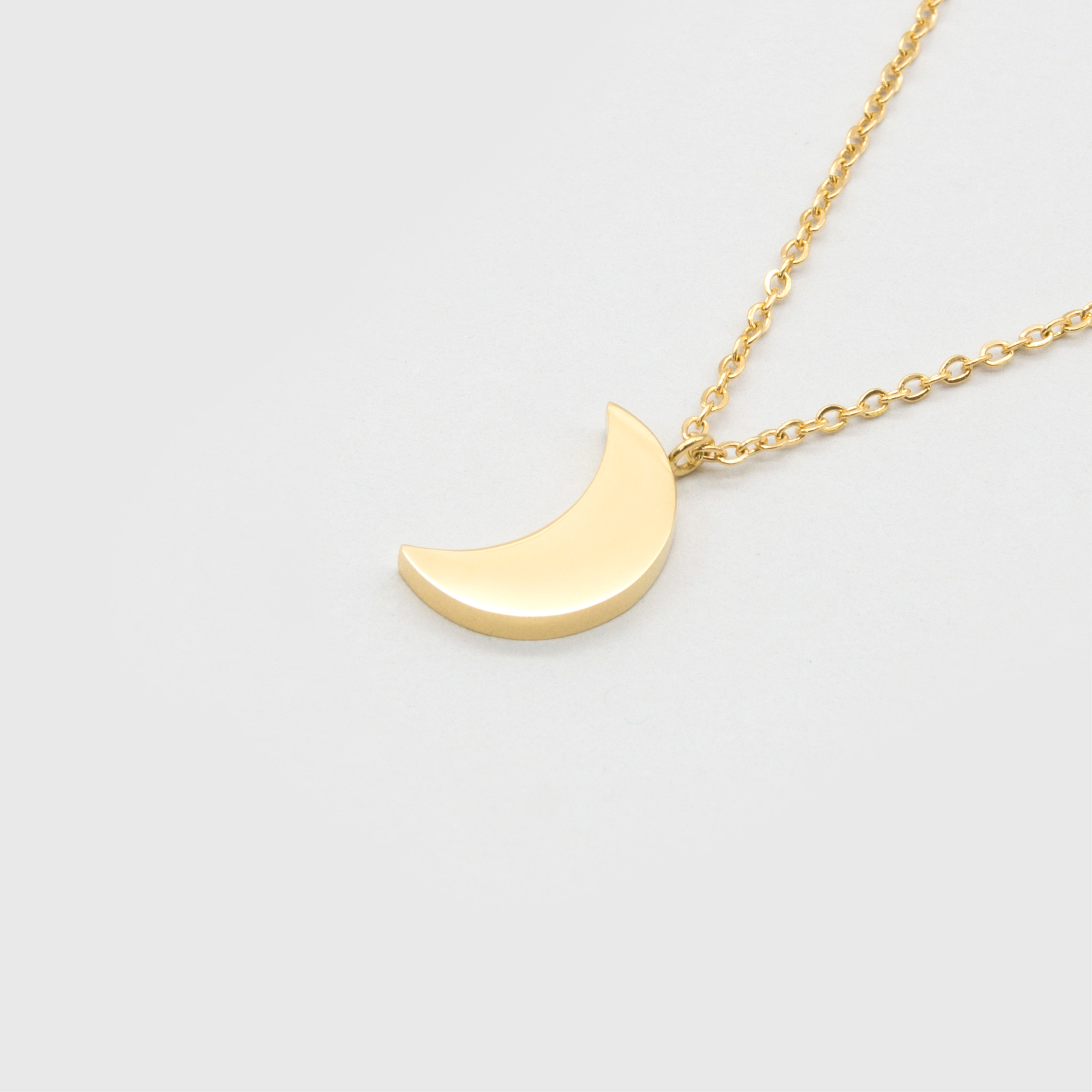 Kuku gold crescent moon necklace