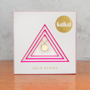 Kuku gold circle necklace in packaing