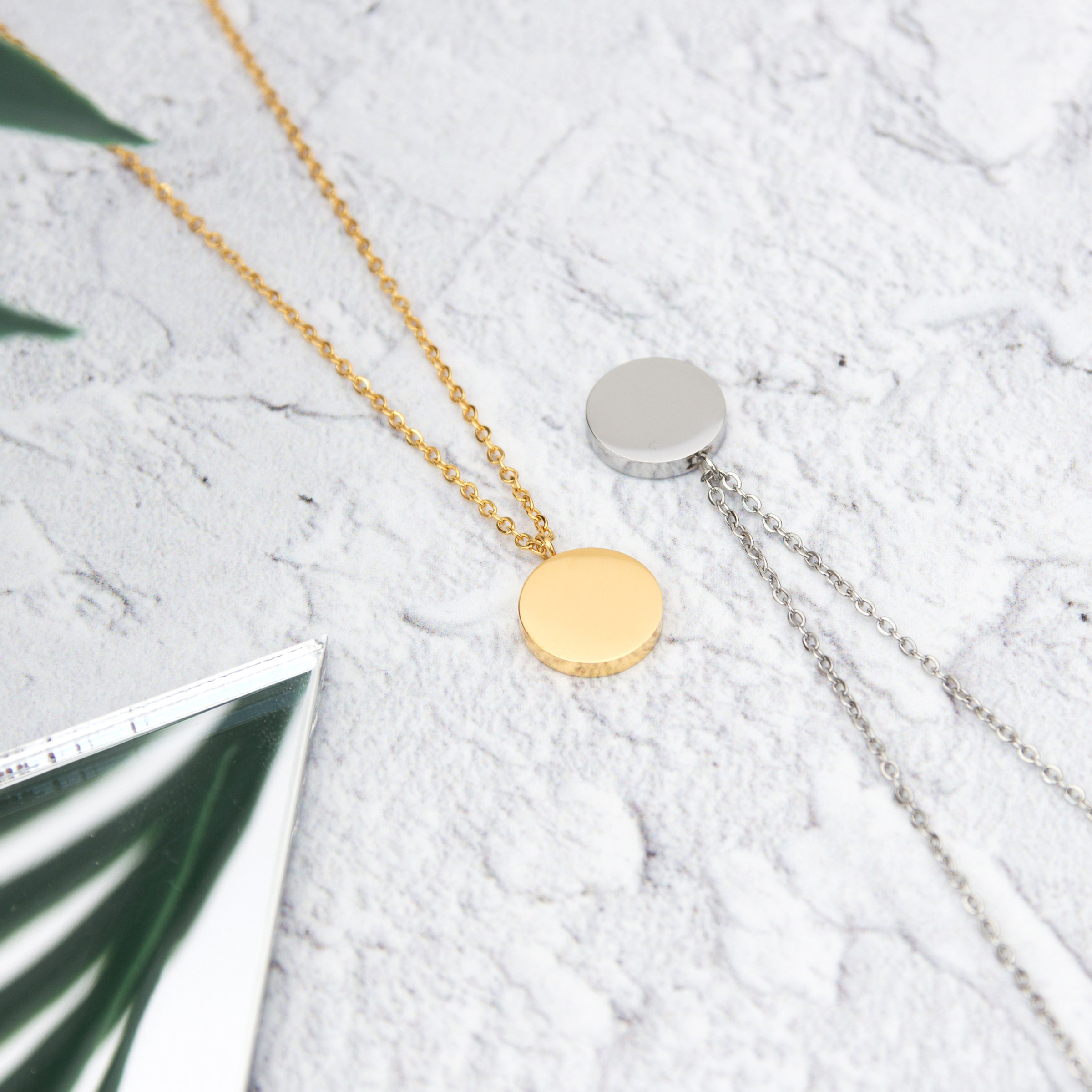 Kuku gold and silver circle necklace