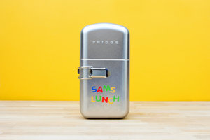 Sam's Lunch written with alphabet stickers on front of Fridge Lunch Box