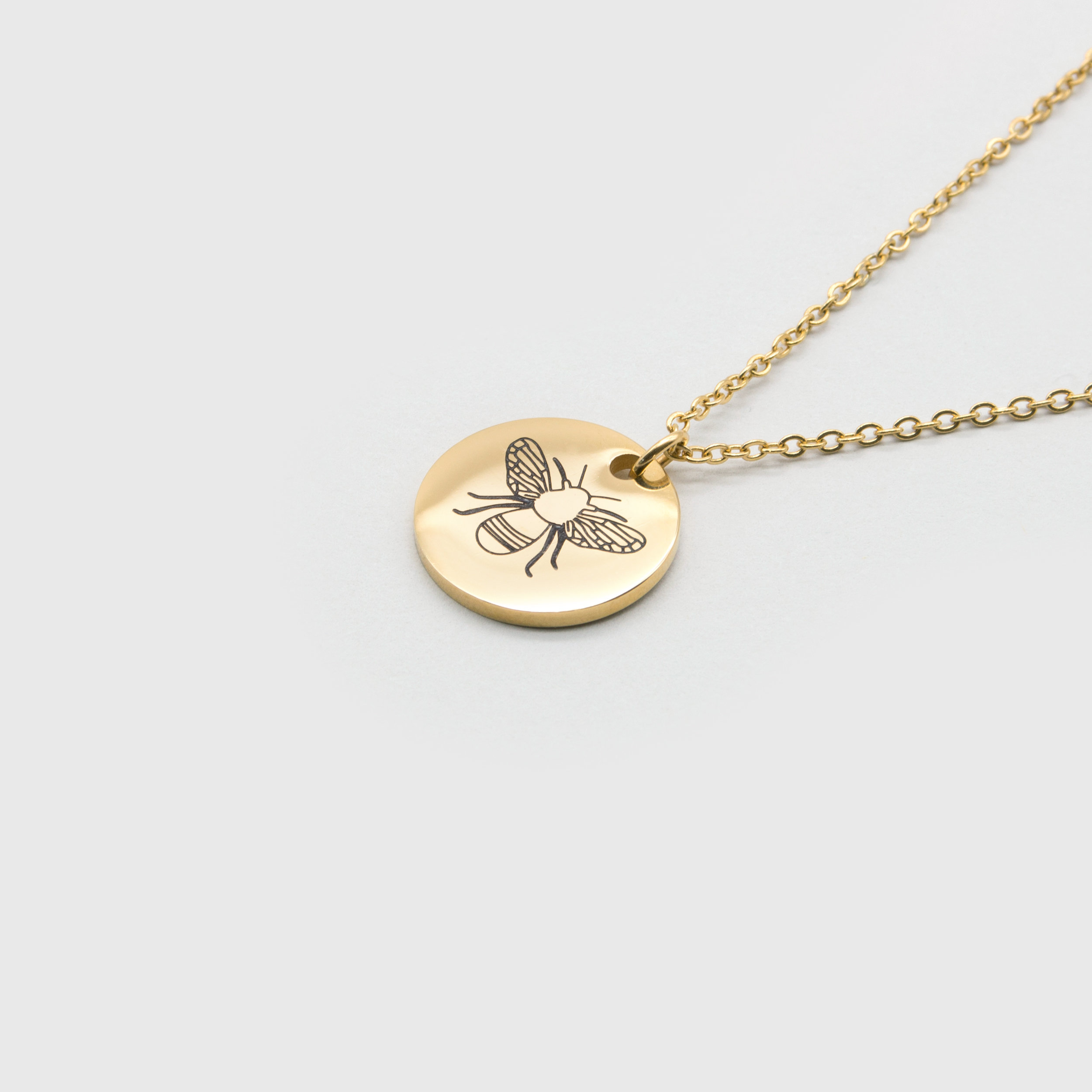 Kuku gold bee necklace