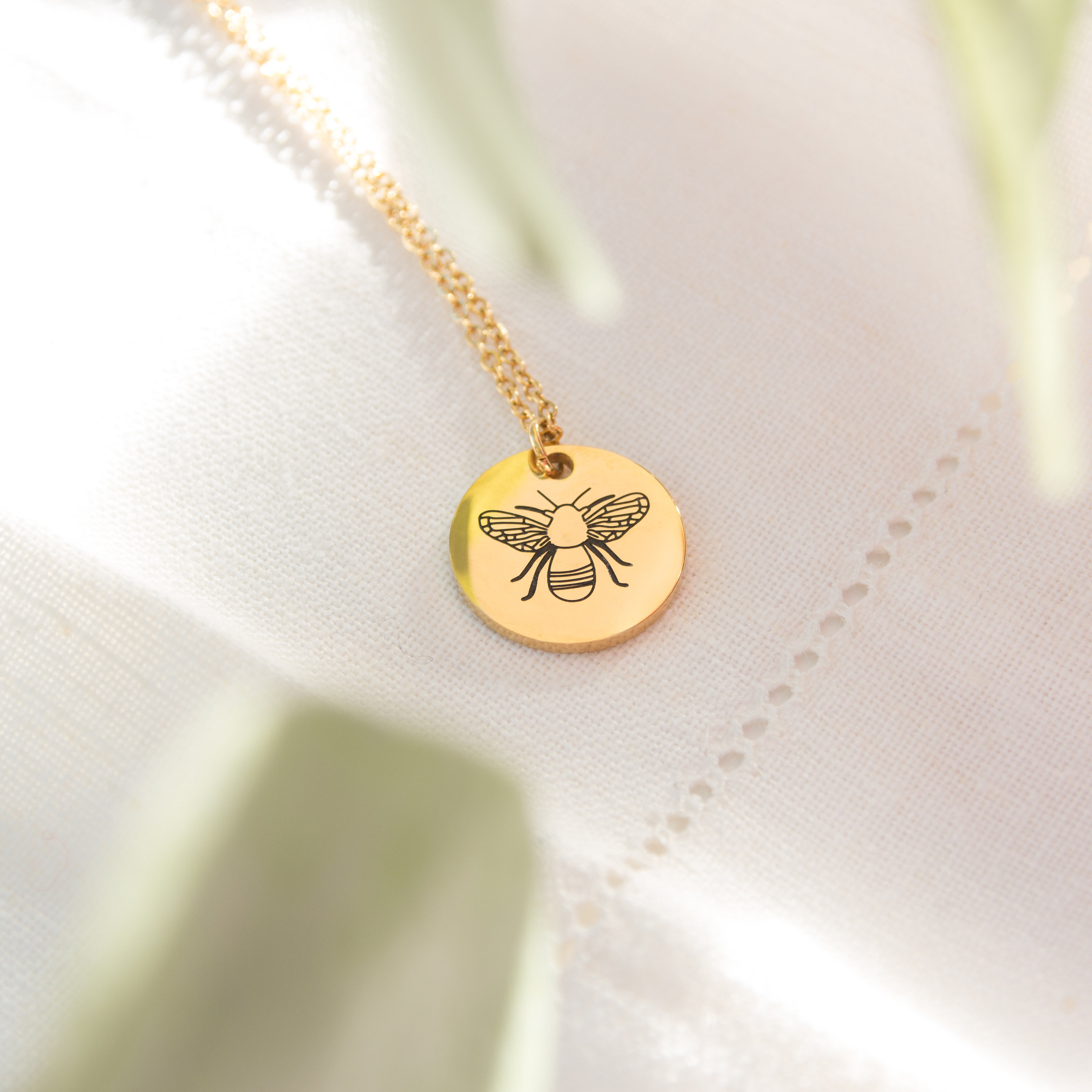 Kuku gold bee necklace 