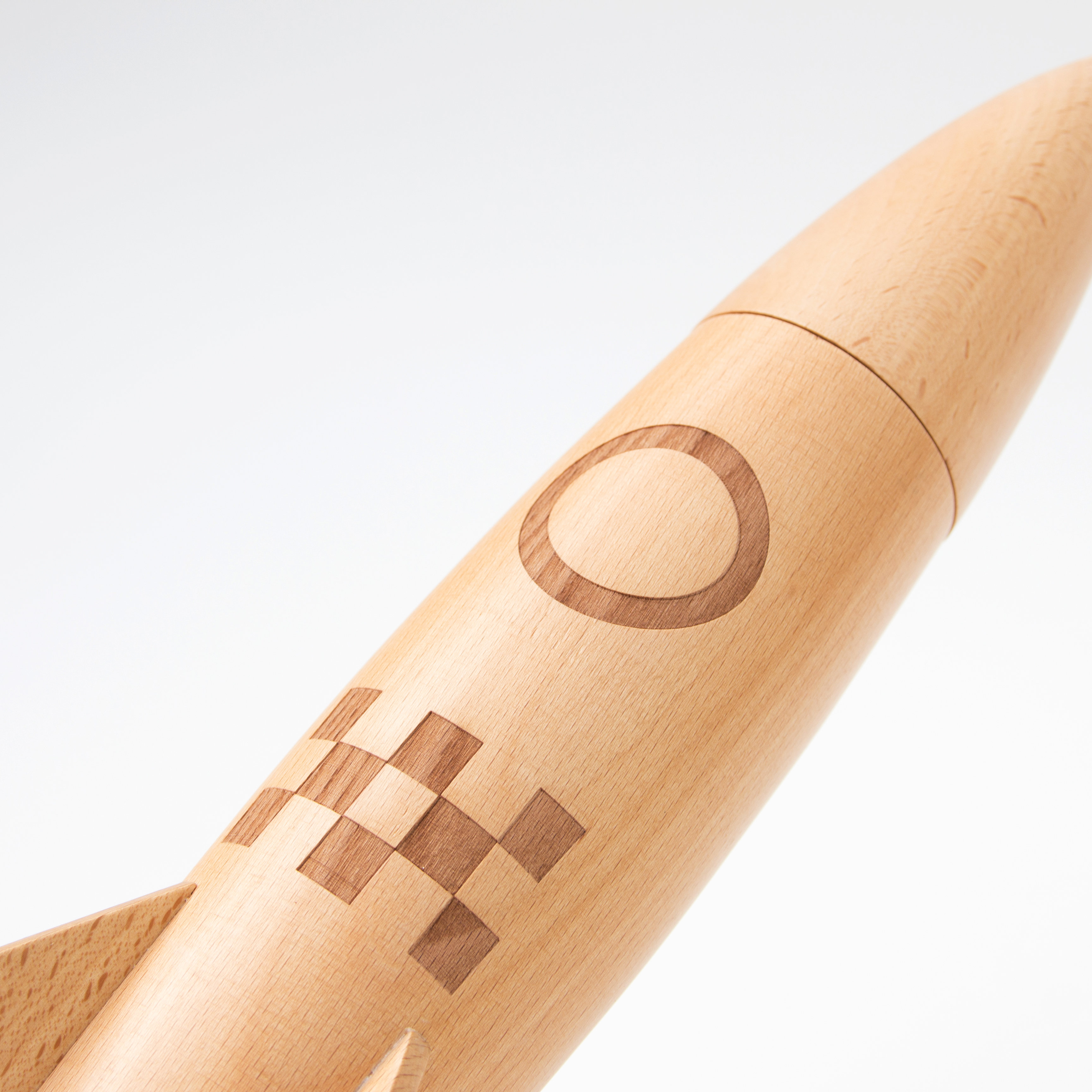 Natural wooden rocket grinder close up