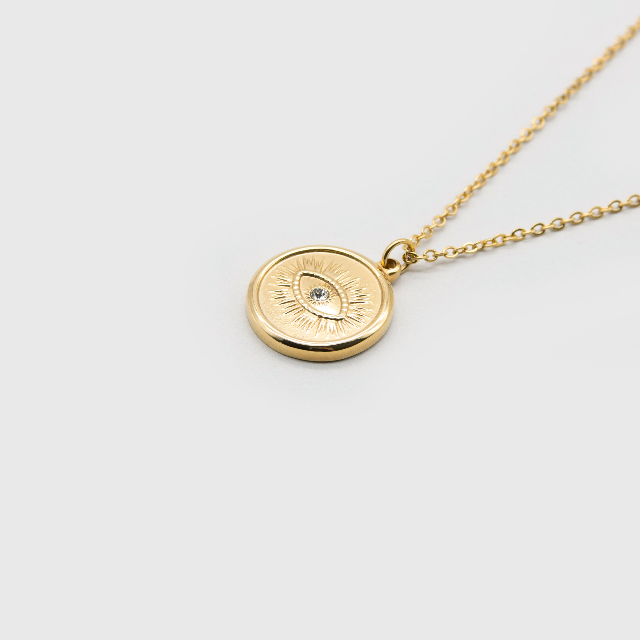 Kuku gold eye coin necklace with stone