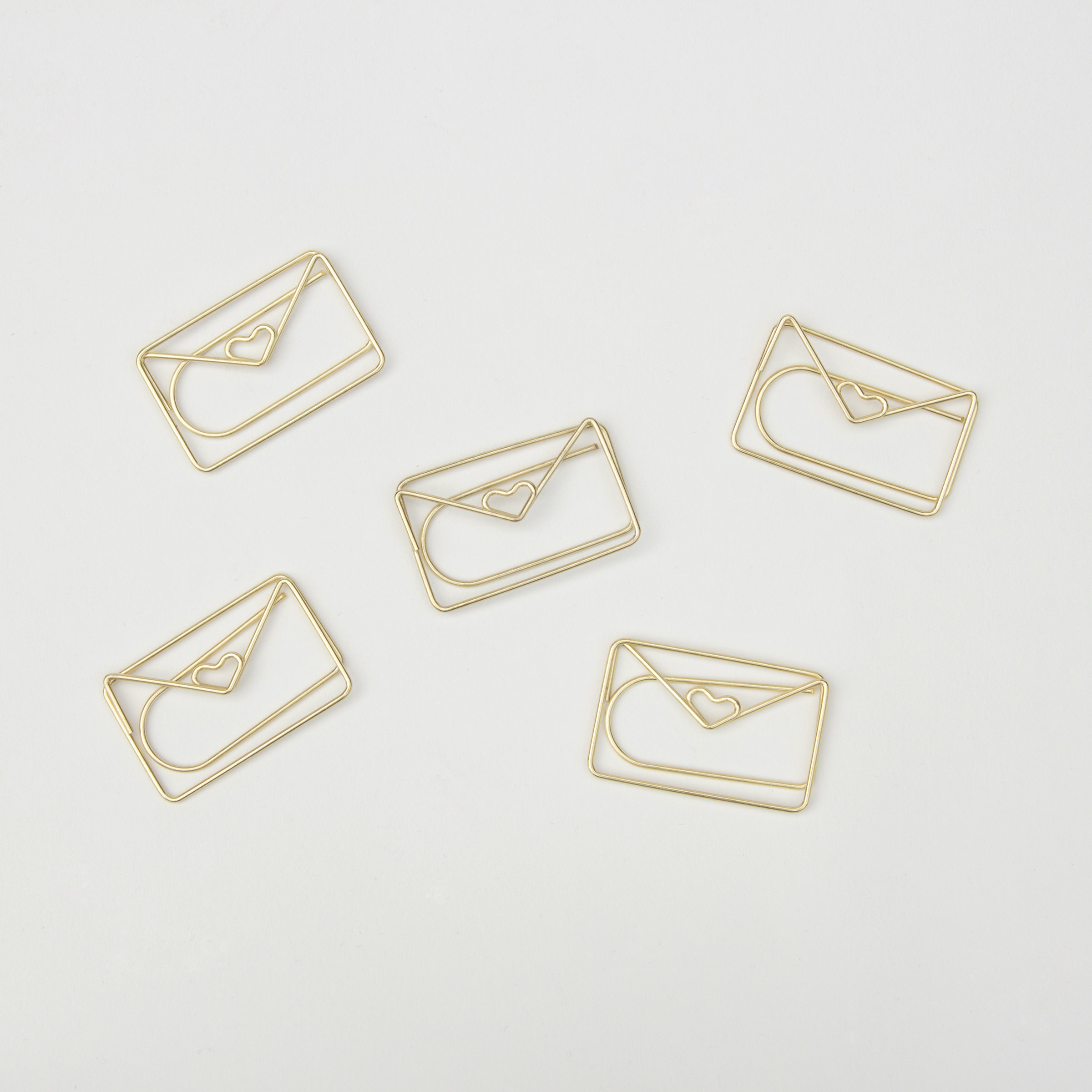 Envelope shaped paper clips in gold Envelope shaped paper clips in gold