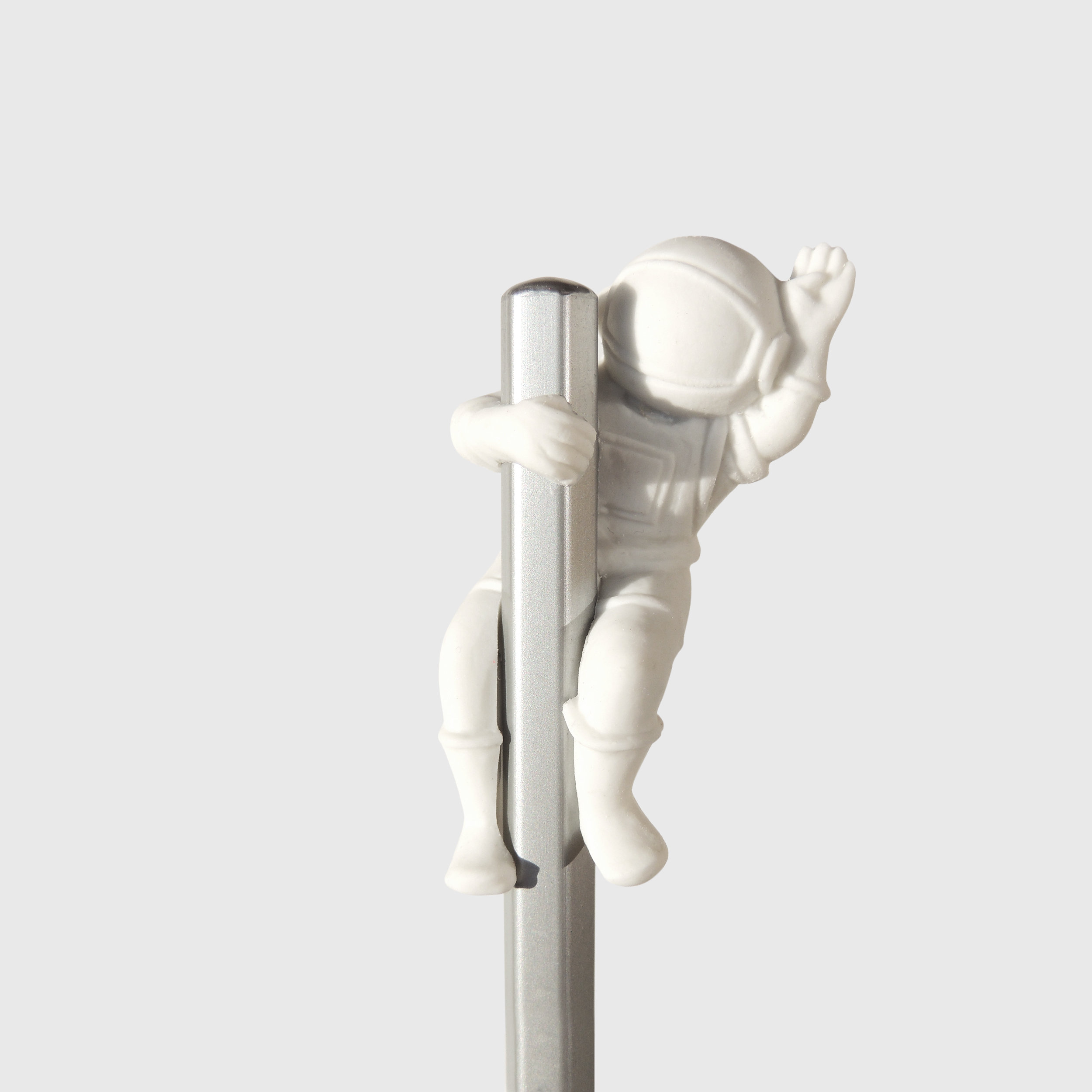 Astronaut eraser on silver pencil