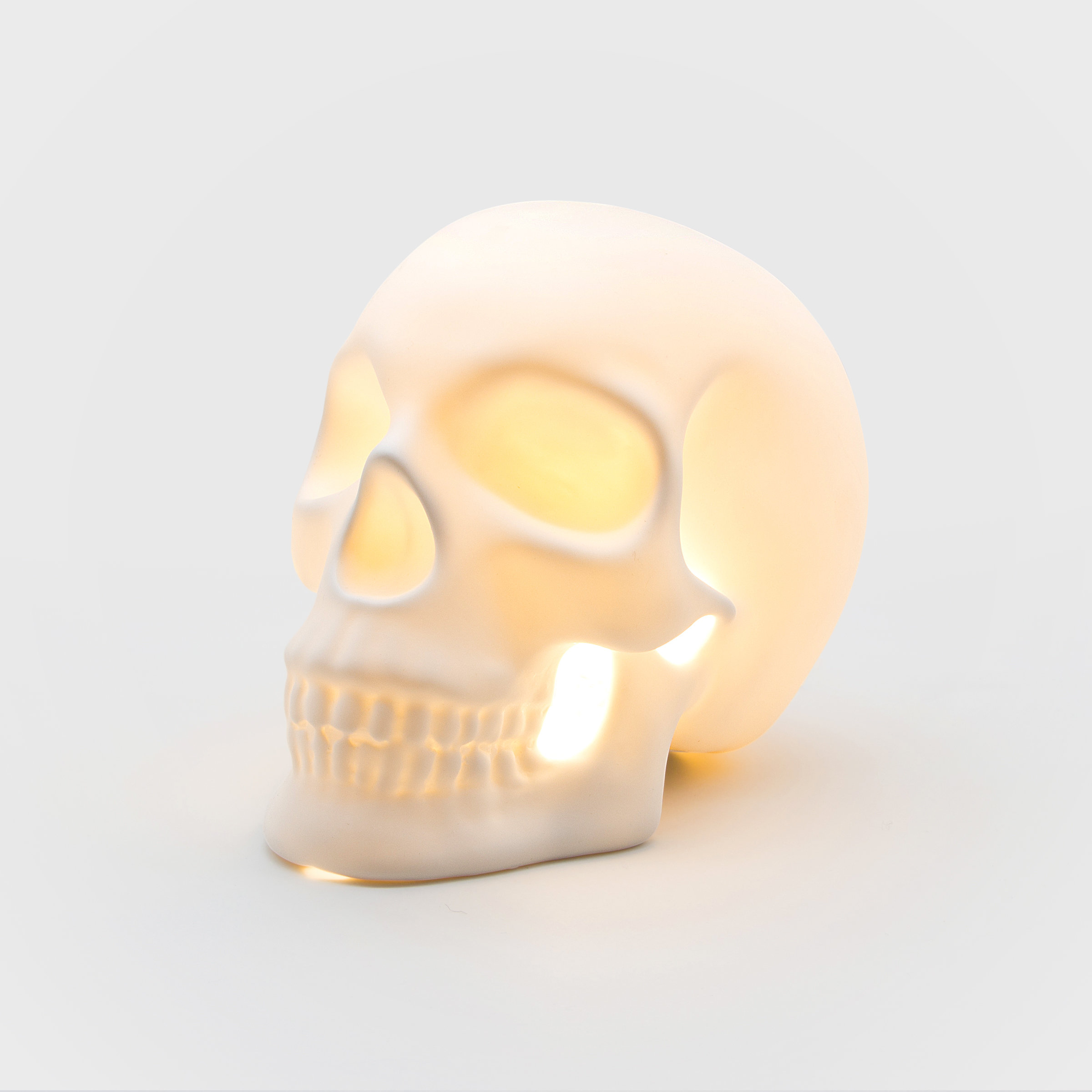 Decorative skull shaped lamp made from ceramic