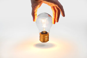 Portable rechargeable cordless light bulb