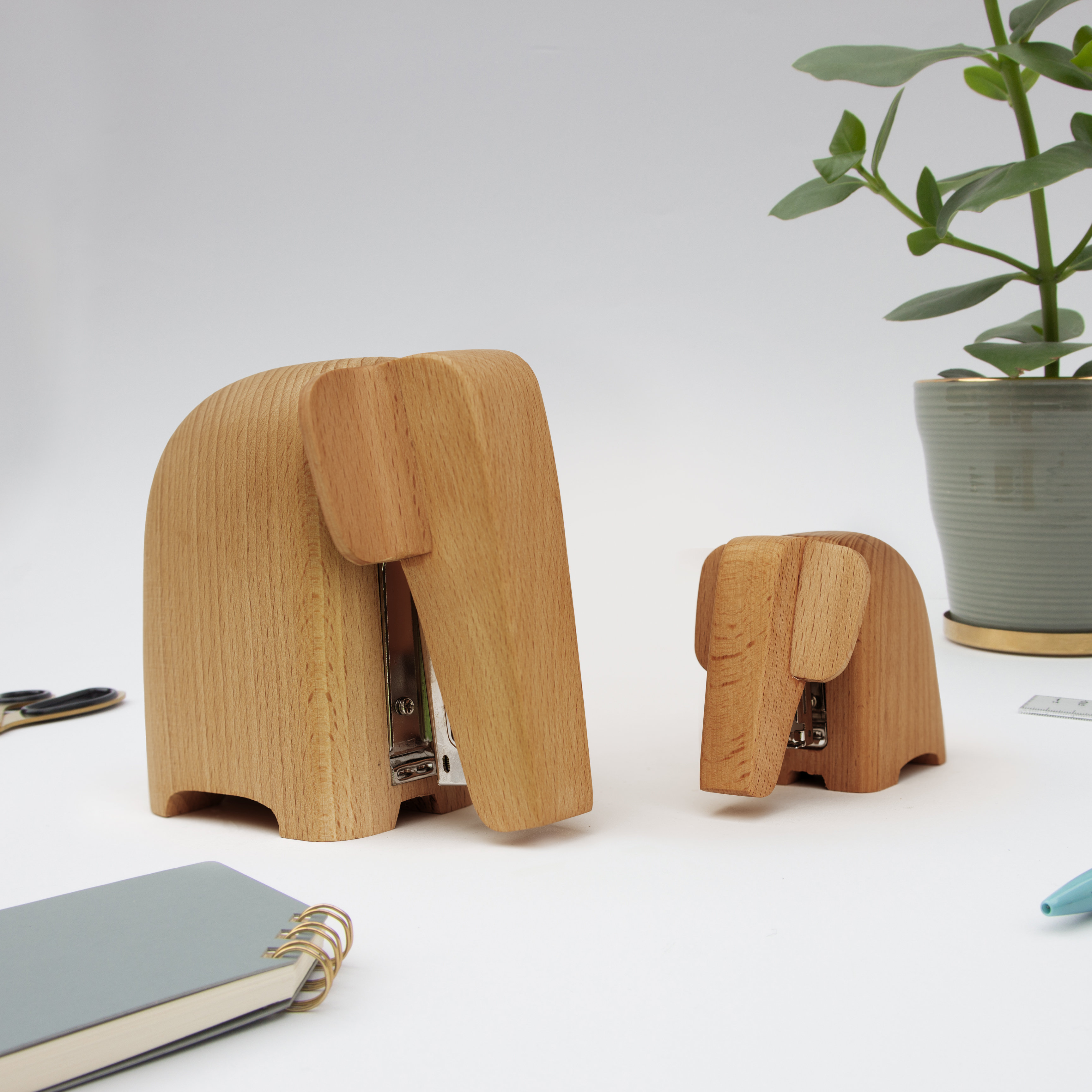 Pair of wooden elephant staplers