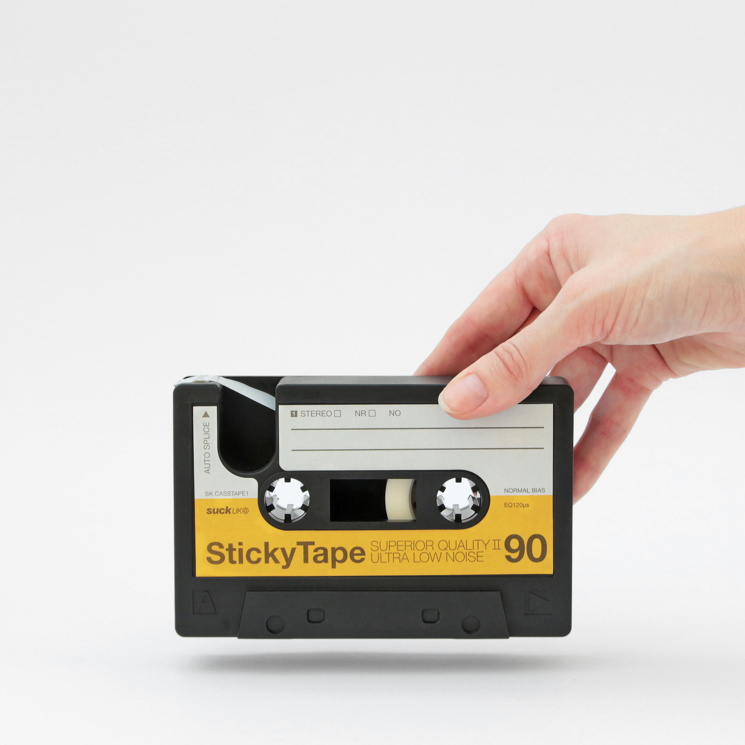 Stick-Tape-Dispenser Cassette. In Hand - for scale.