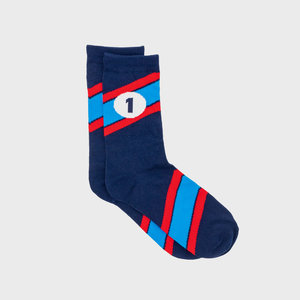 Motor racing socks in an oil can