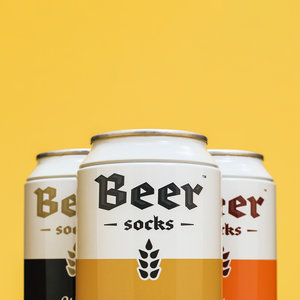 Socks packaged in beer cans