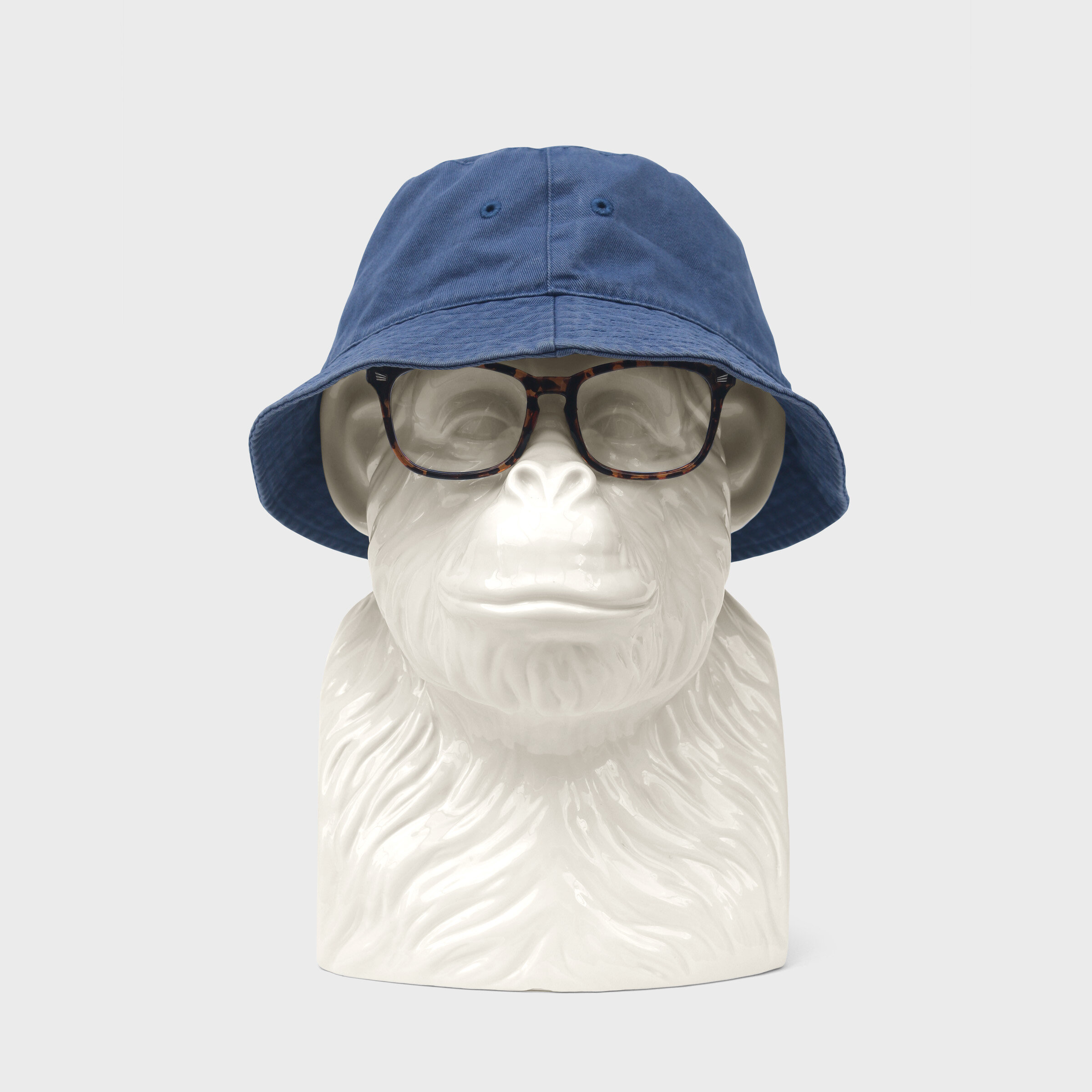 chimp with bucket hat