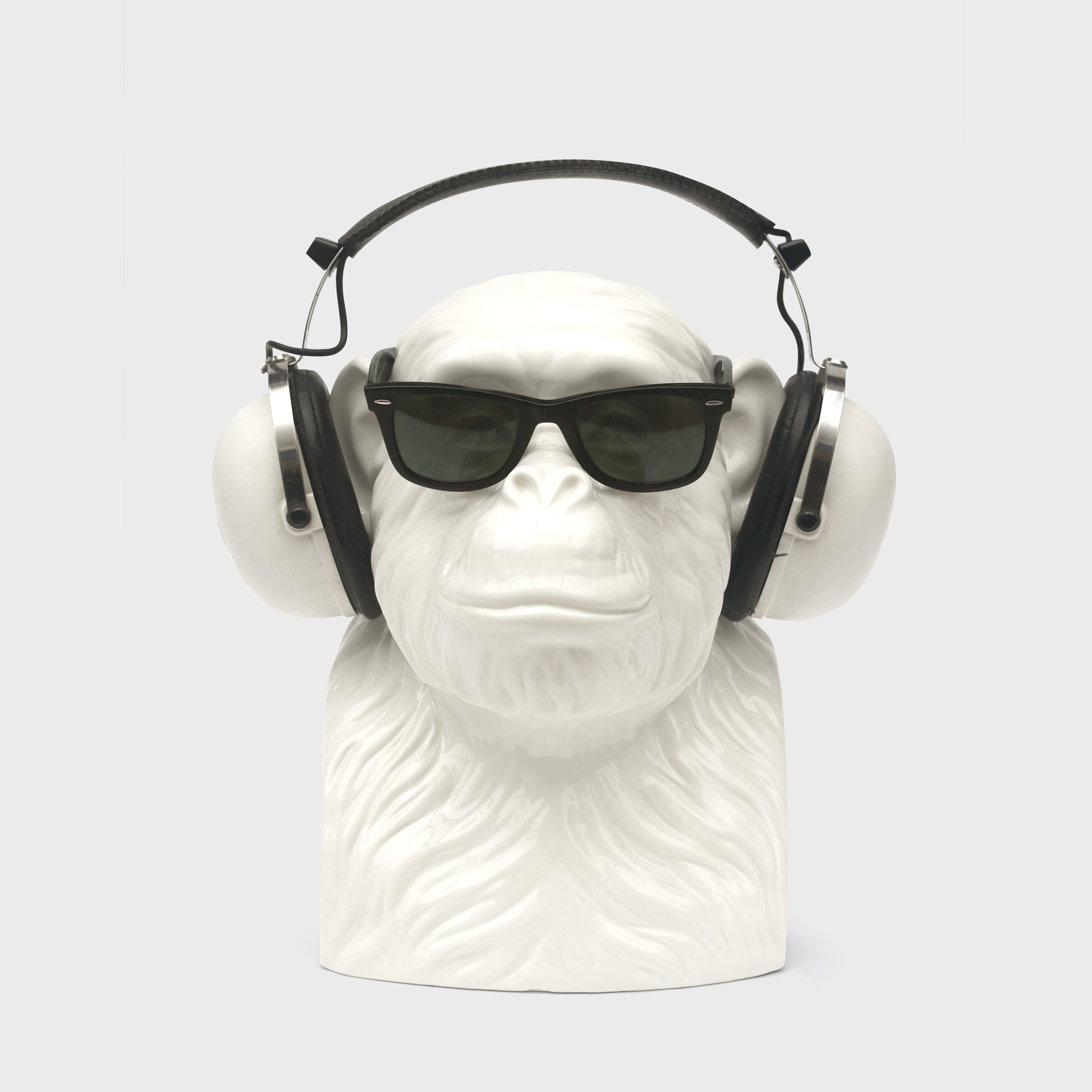 chimp with shades and headphones