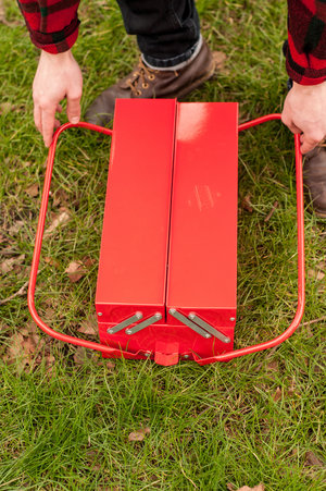 Carry handles on barbecue fold under to become legs.