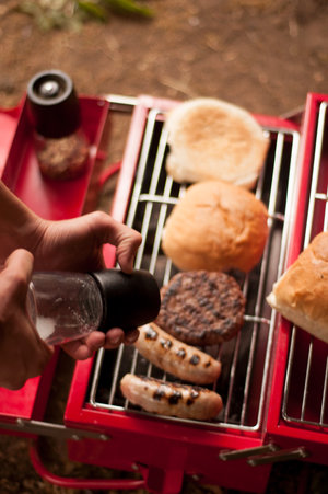 Preparing food on a portable BBQ