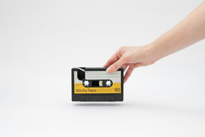 Tape-Dispenser Cassette. Hand for scale.