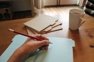 writing on coloured tabbed binders