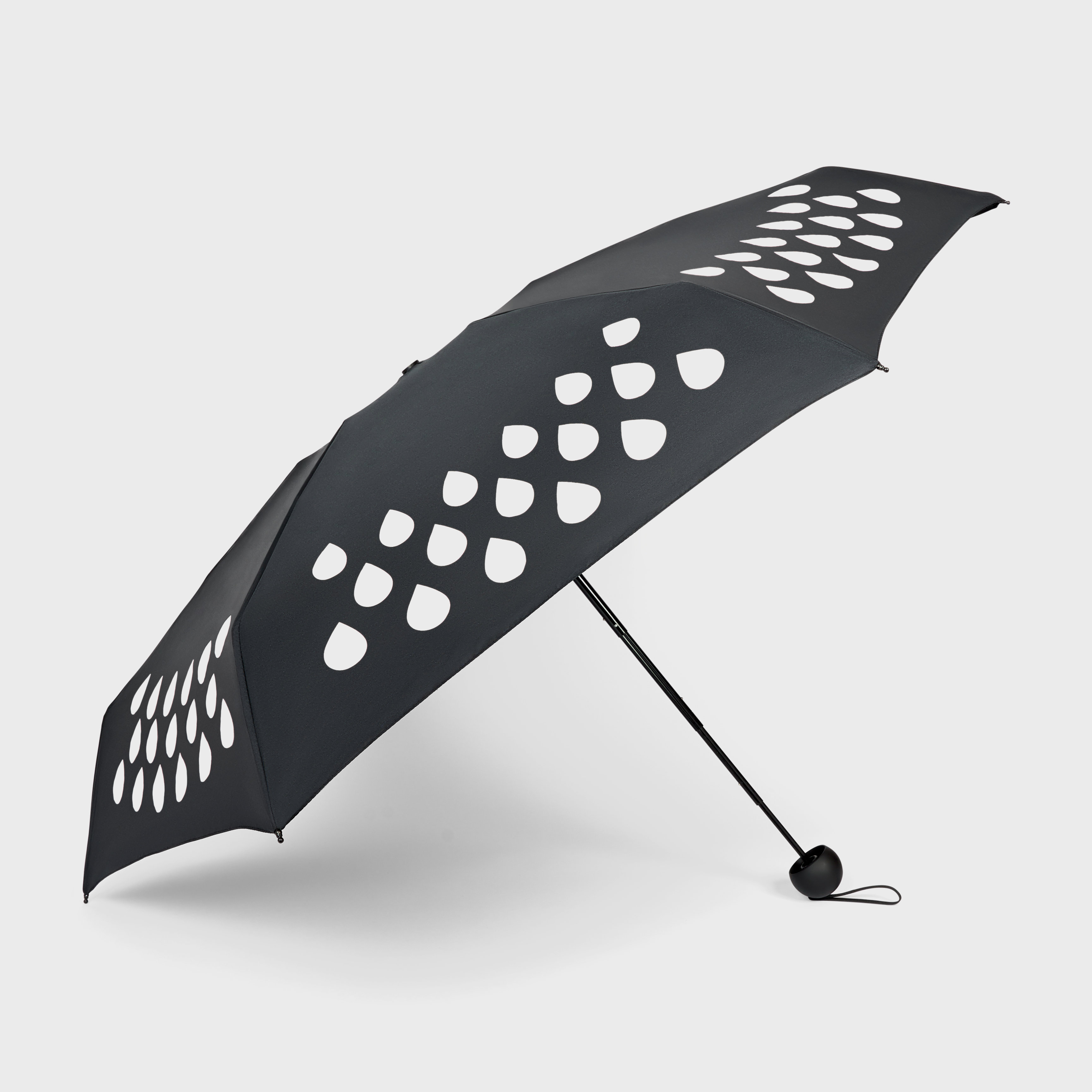 Compact Colour Change Umbrella : Changes colour when it rains.