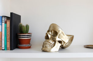 gold desk skull on table