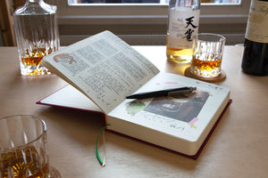 My drinks journal open on dining table