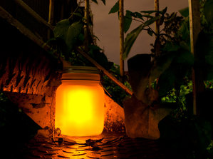 fairy lights jar on garden steps