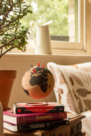 small globe to mark travels