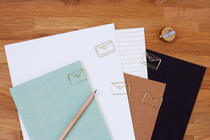 Fun gold envelope paper clips, cool stationery