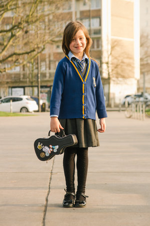 cool kids carry their lunch in a guitar case