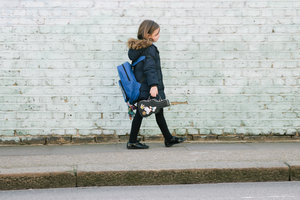 walking to school with lunchbox